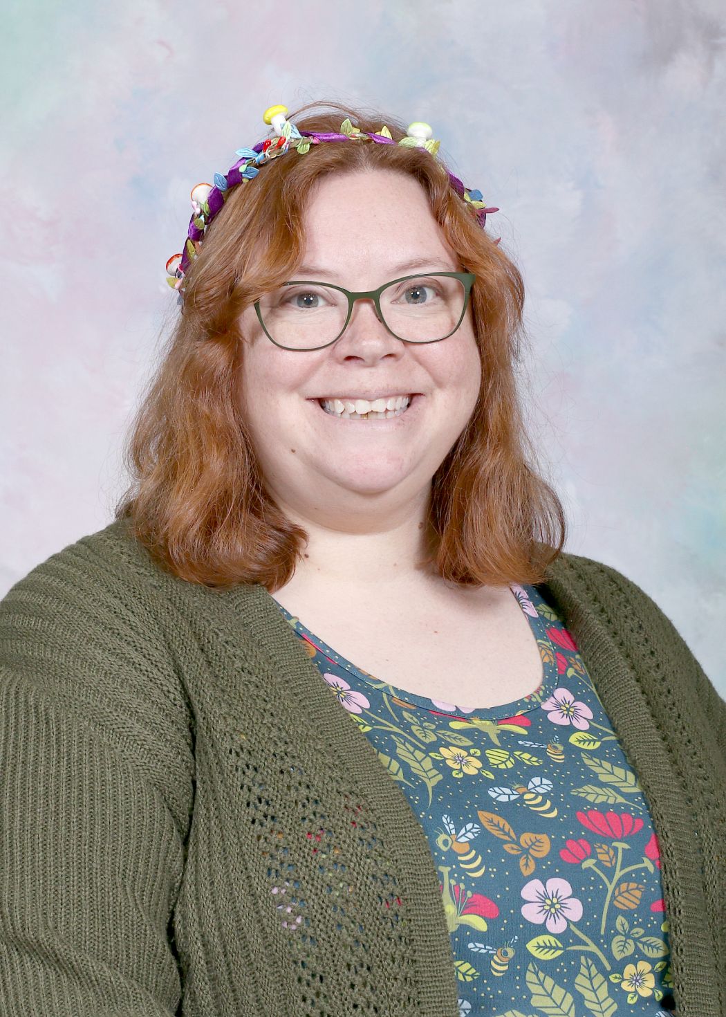 Ms. MacDonald smiling in staff directory portrait photo