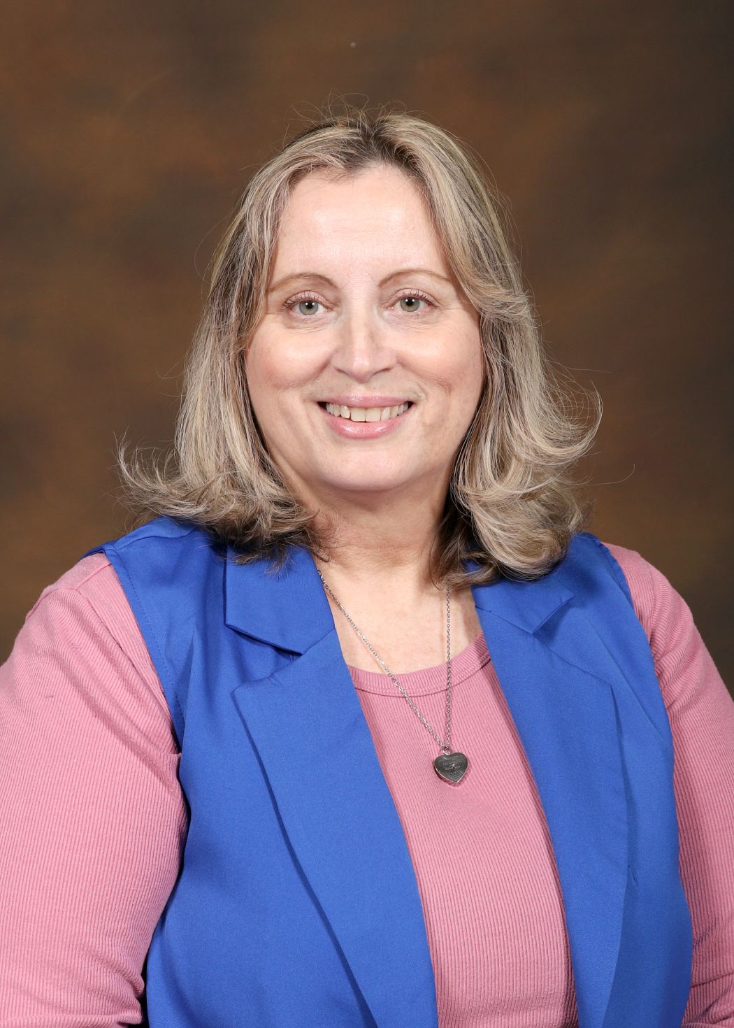 Ms. Durand smiling in a professional staff portrait photo