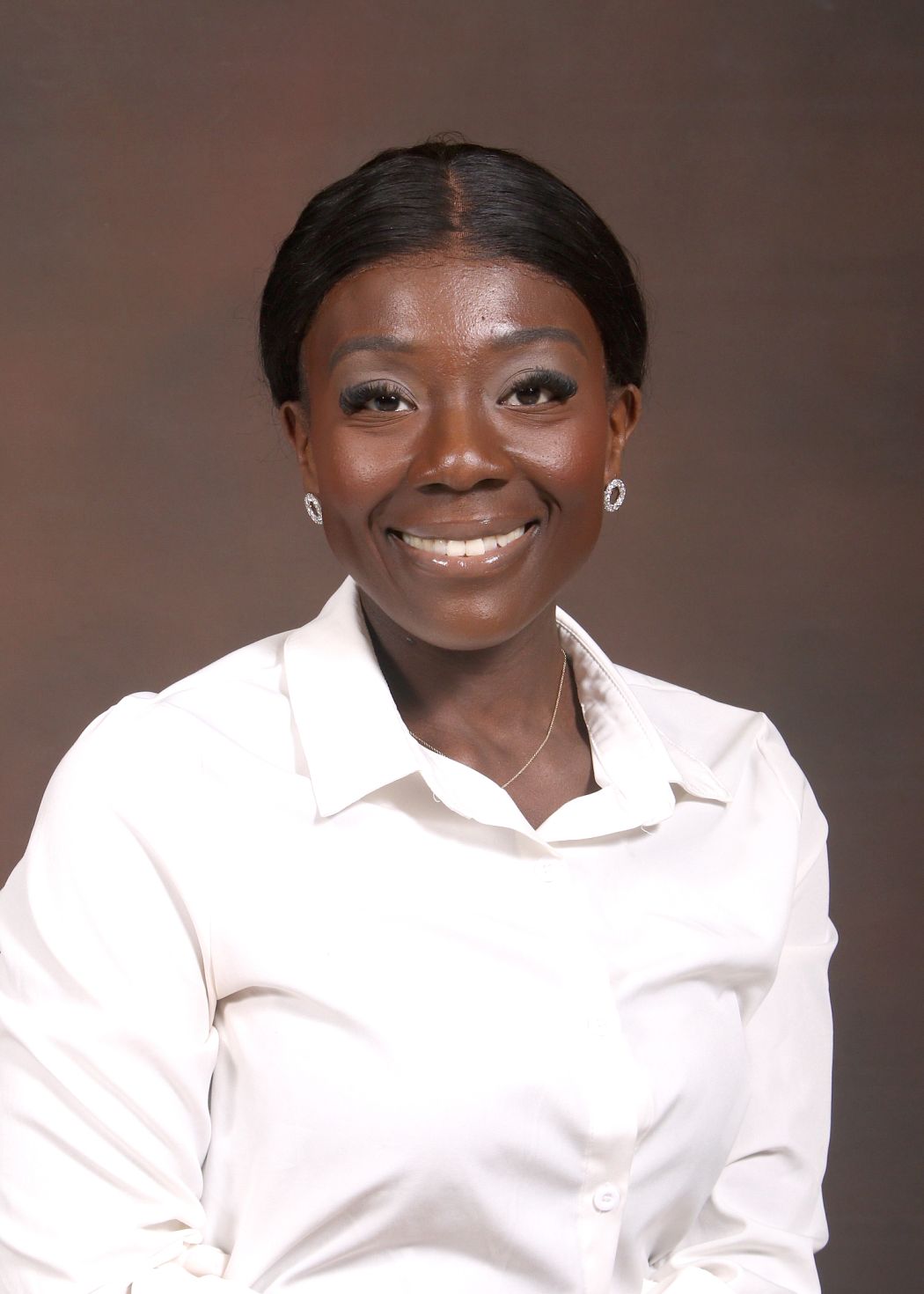 Staff member Ms. Nandwani smiling in professional headshot photo