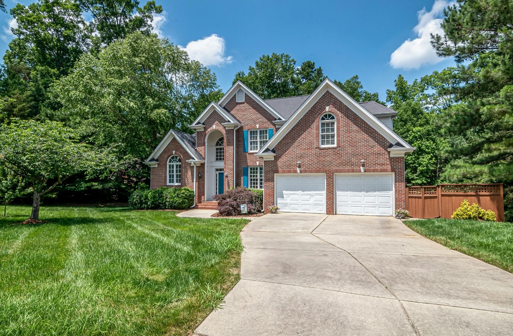 House with overgrown yard
