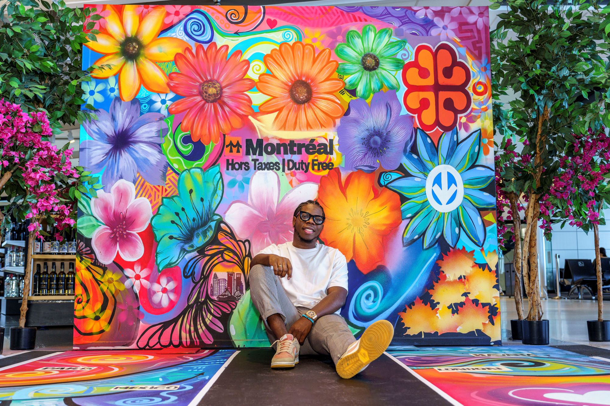 The installation in the international terminal captures the energetic and unique spirit of Montréal and was painted by talented team member Dieujuste Marc Alexandre