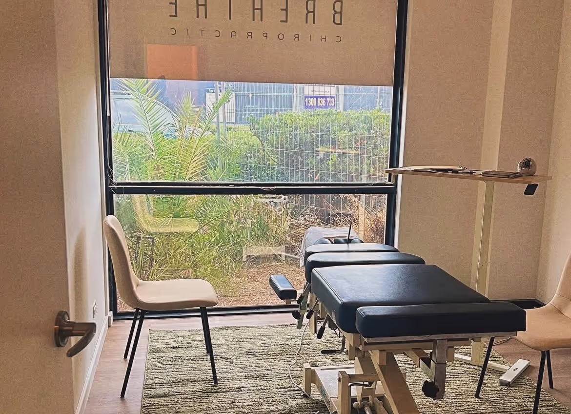 A massage table in a therapy room.