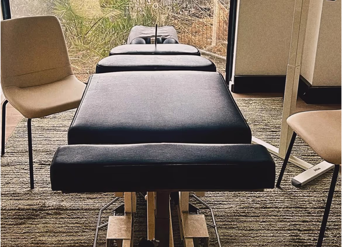 A massage table in a therapy room.