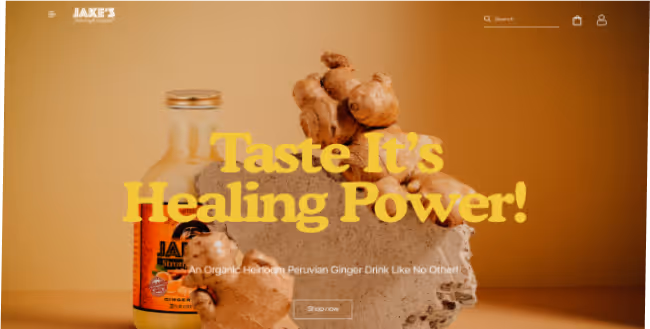 A bottle of Jake's organic Peruvian ginger drink and fresh ginger roots with text 'Taste It's Healing Power!' on a yellow background.