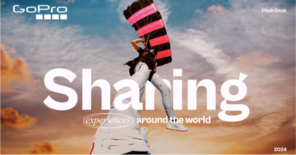 Person parachuting holding hand of another person during sunset with GoPro logo and text 'Sharing experiences around the world'.