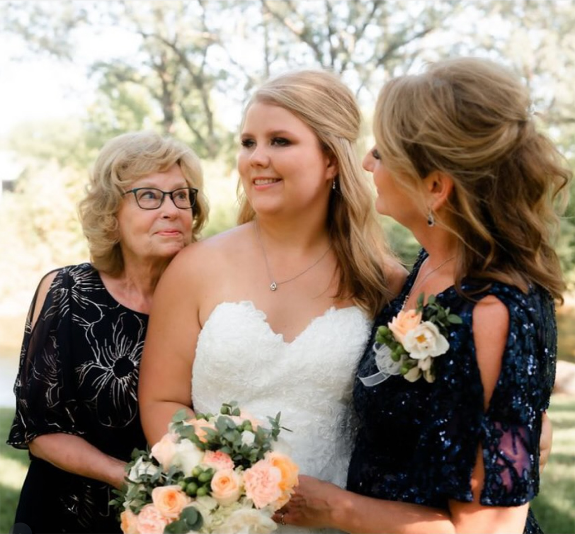 mothers with bride wearing dresses