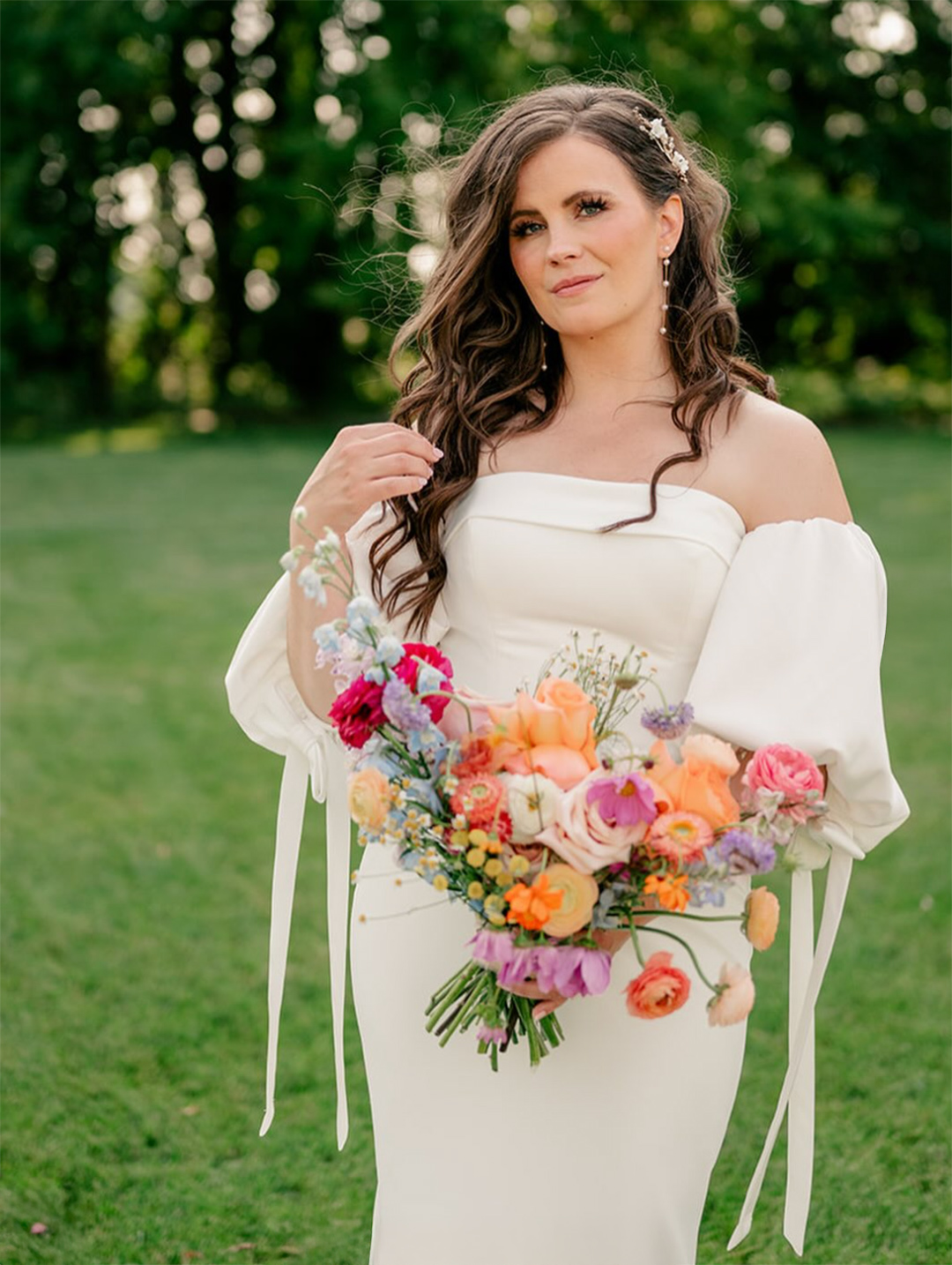 bride in wedding gown holding flowers