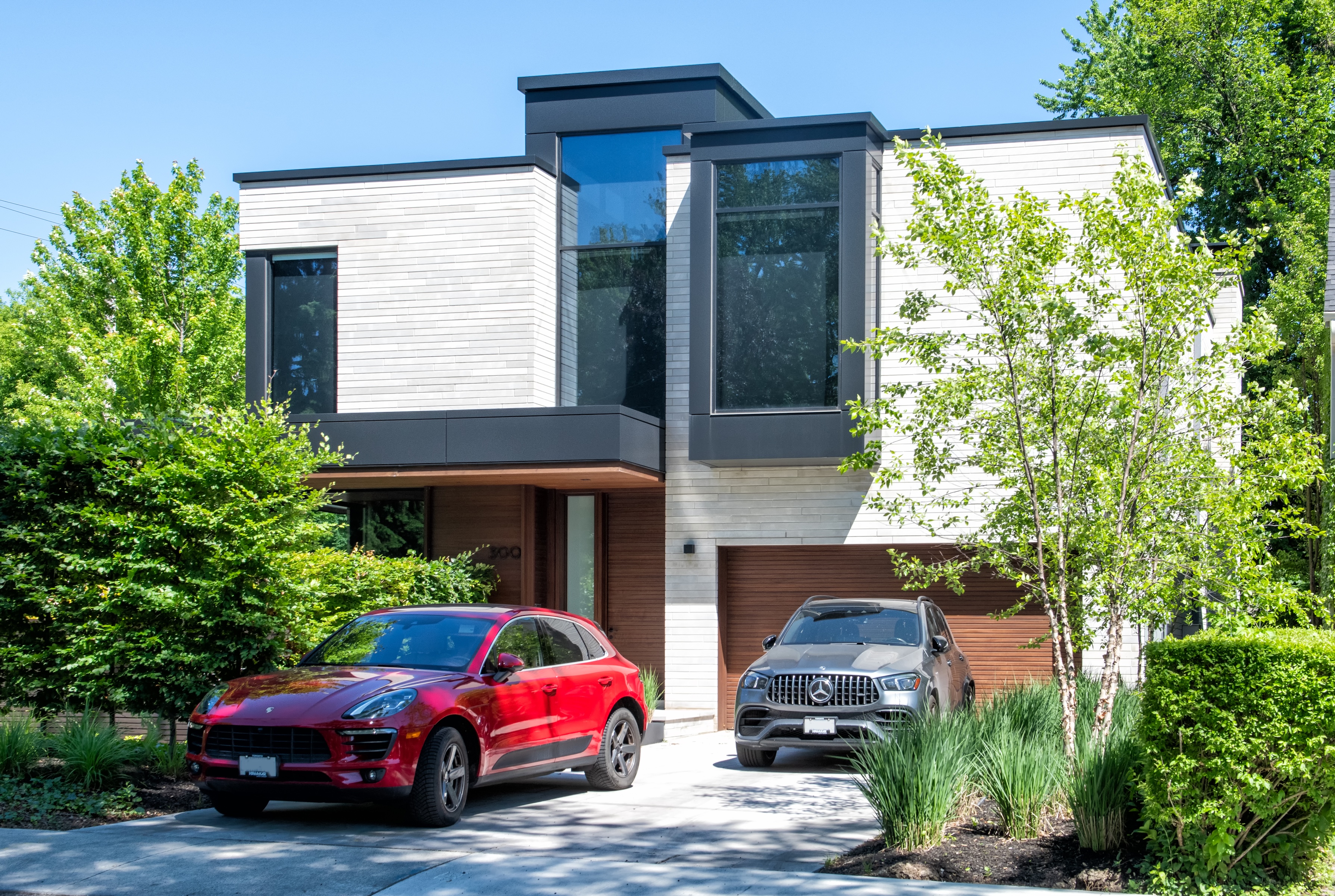 Contemporary custom home with steel-framed cantilevered upper storey