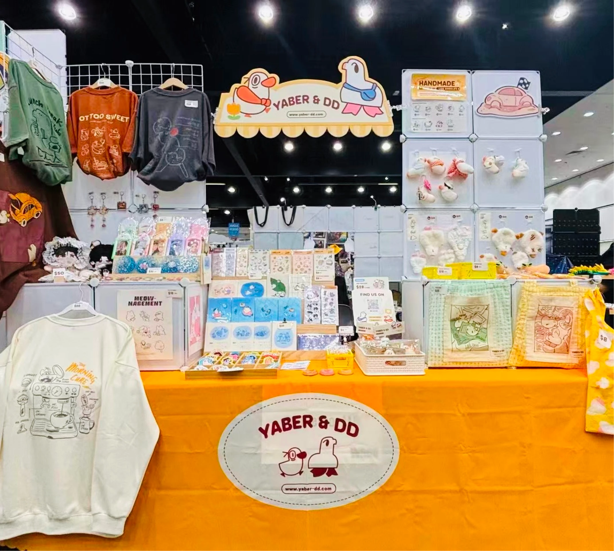 A drawing of a yellow and orange booth