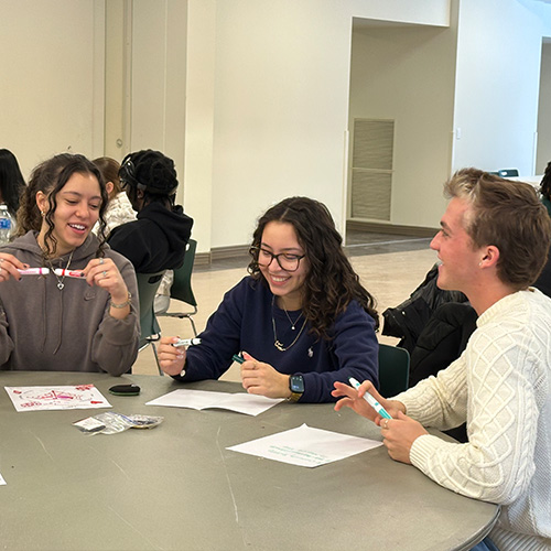 Students passing Flop Ball during first year experience.