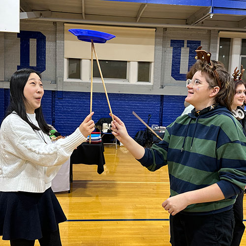 Students passing Flop Ball during first year experience.