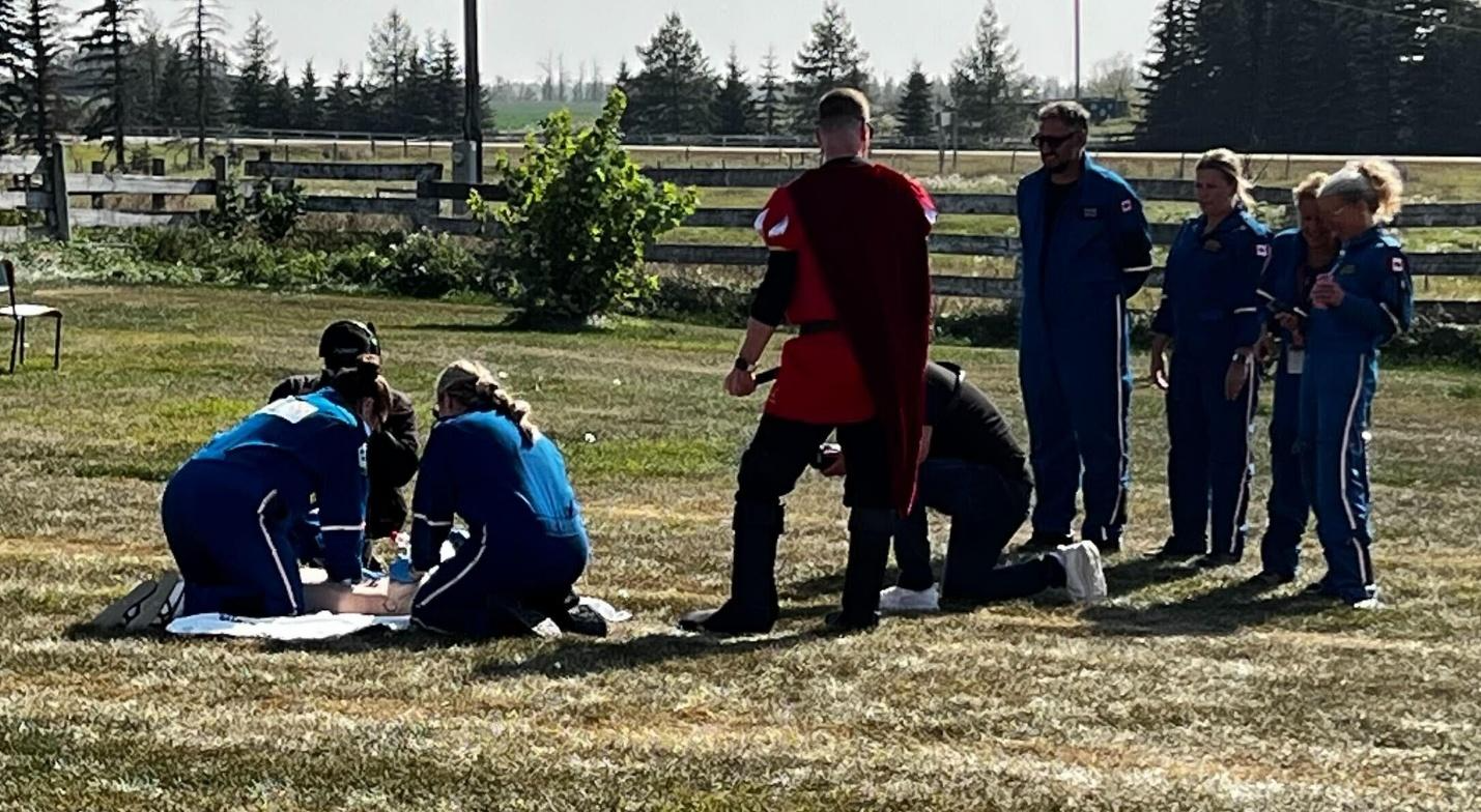 A group of people in a fieldAI-generated content may be incorrect.