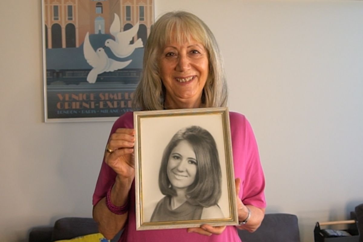 Marilyn Cornally with a photo from her younger days.