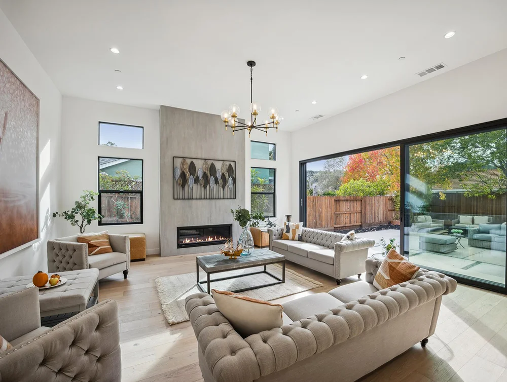 Living room of a modern house remodeled by Global Arch Construction