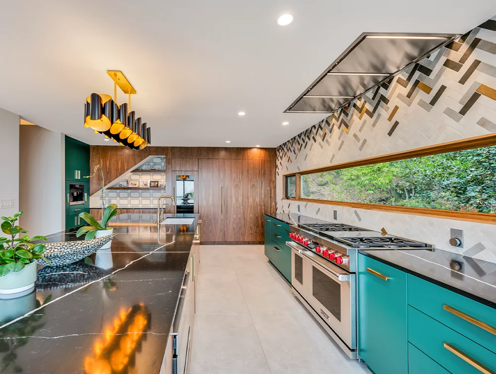 Modern kitchen of newly renovated home by Global Arch Construction
