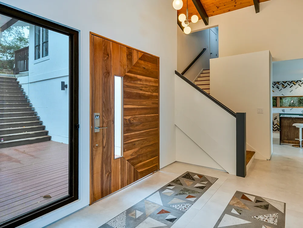 Entry hall of a newly renovated home by Global Arch Construction