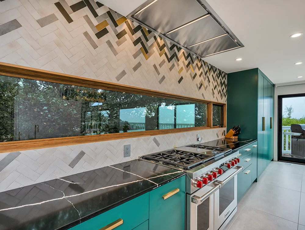 The kitchen of a newly renovated home by Global Arch Construction