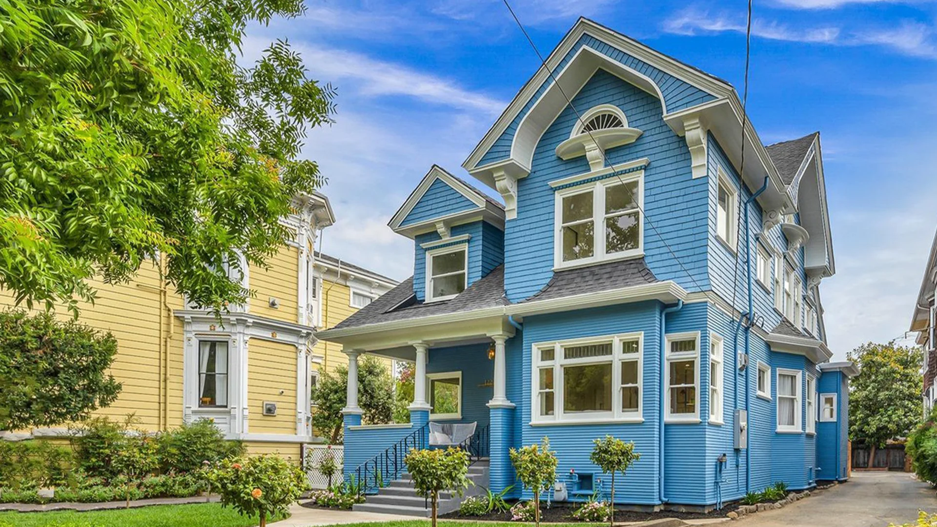 Before and after of a historic home renovated by Global Arch Construction