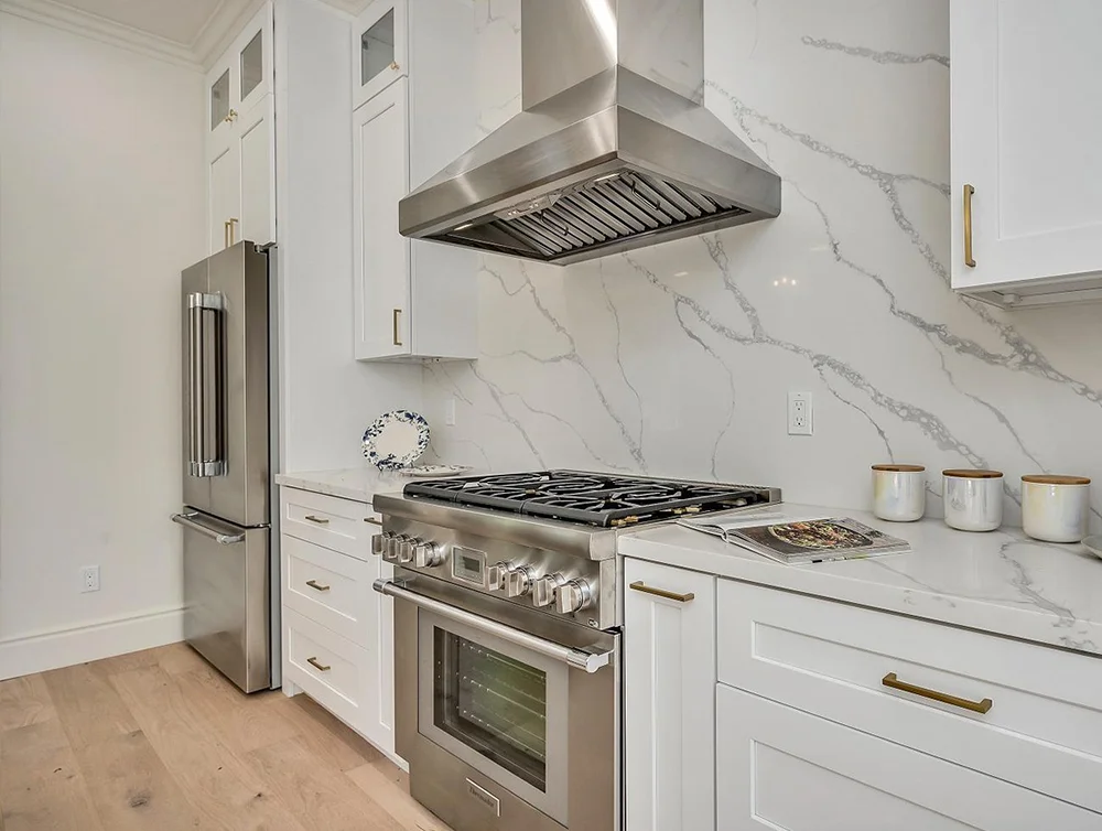 Modern kitchen of a historic home remodeled by Global Arch Construction
