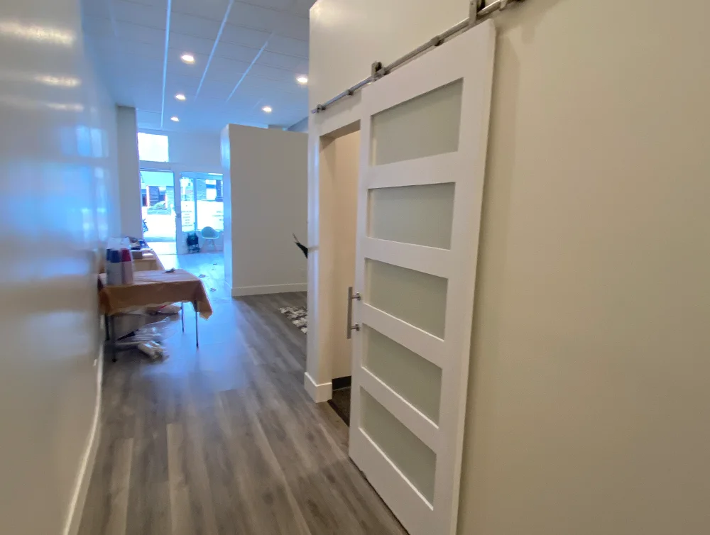 Hall of a chiropractor salon remodeled by Global Arch Construction