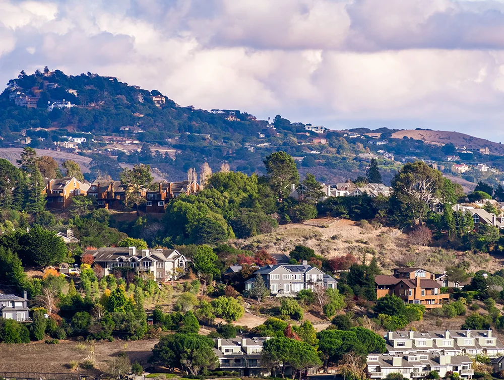 Aerial view of residential neighborhood with scattered houses build on hill slopes, Mill Valley, North San Francisco Bay Area, California