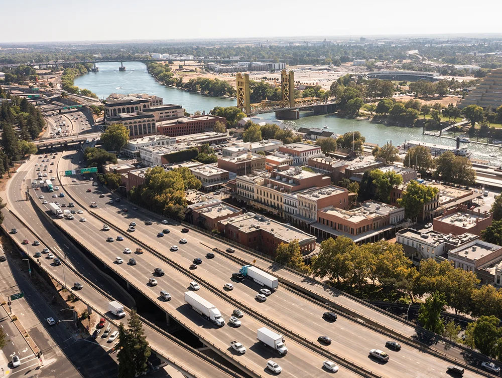 Afternoon aerial view of the historic city center and Tower Bridge of Old Sacramento, California, USA.