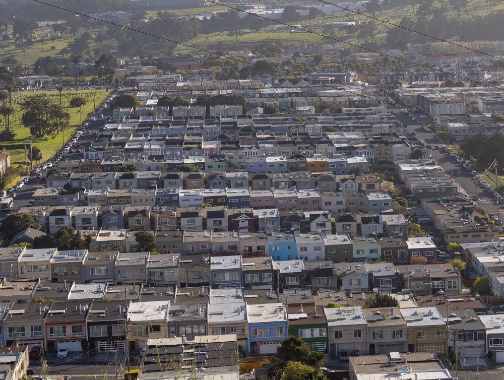 Colorful private homes in Colma, California, showcasing vibrant and diverse architectural styles in a charming suburban setting