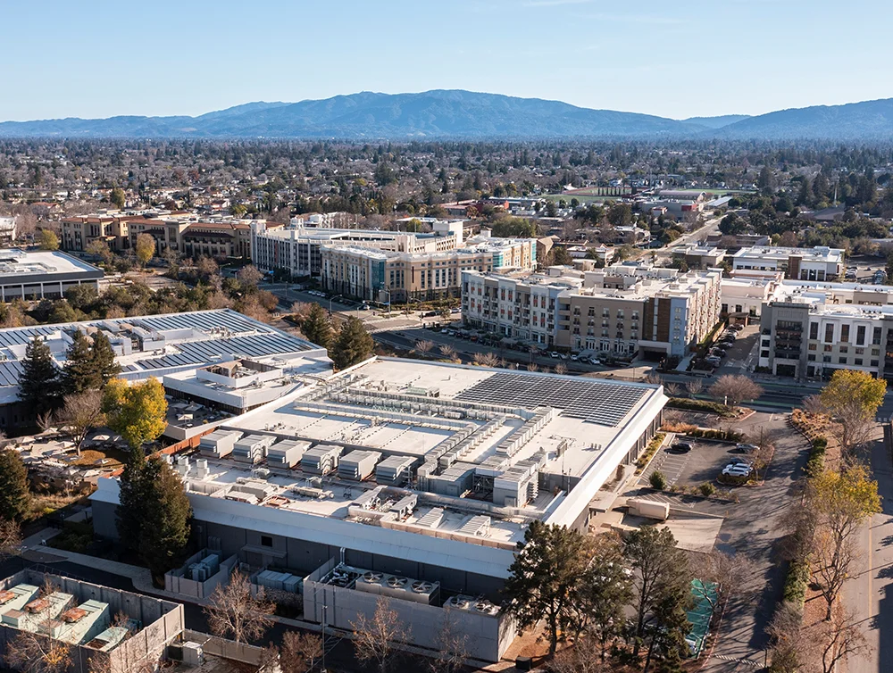 Afternoon sun shines on the buildings of downtown Cupertino, California, USA.