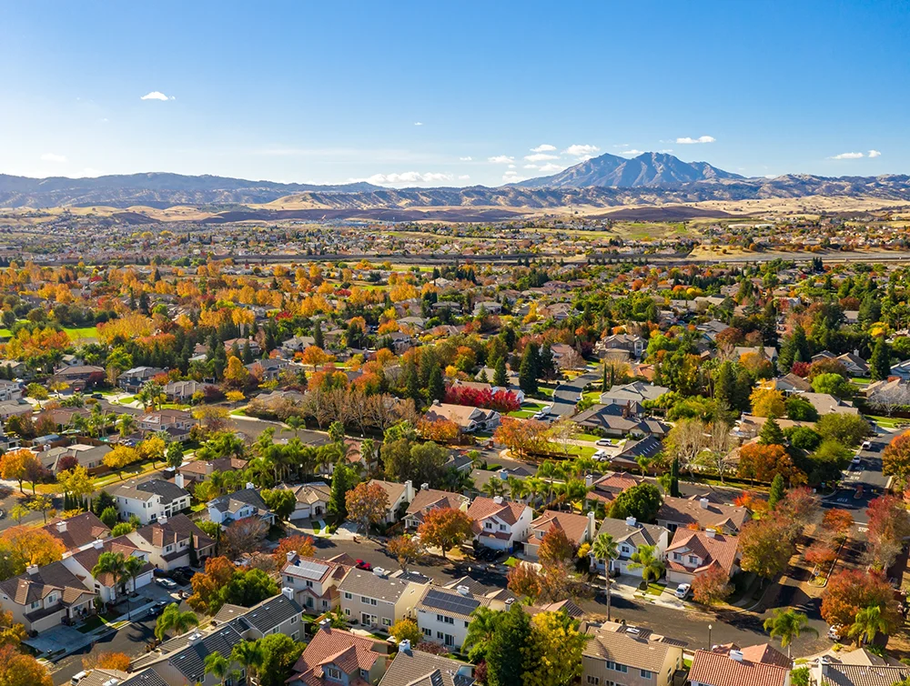 Drone photo over a community in California with beautiful fall colors. 