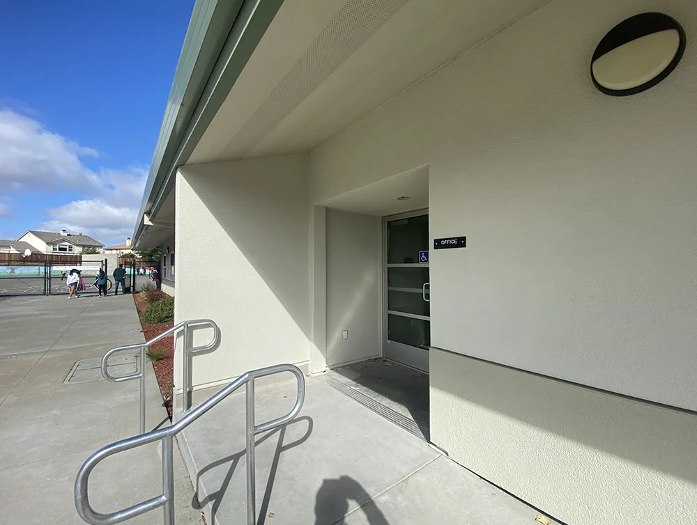 Front entrance of a school renovated by Global Arch Construction