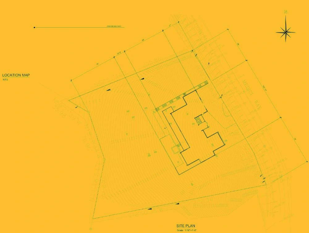 Architectural site plan showing building footprint, property boundaries, and topographic lines on a yellow background.
