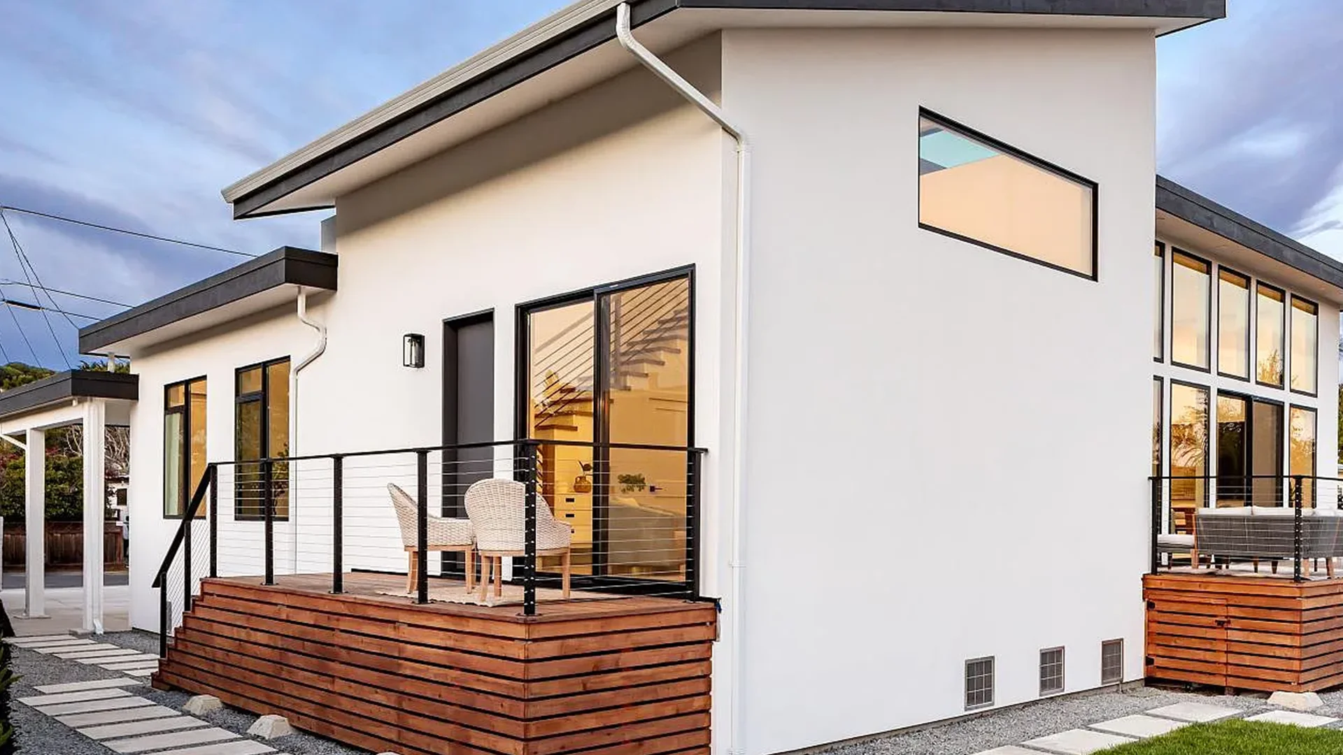 Before and after image of a modern home designed and built by Global Arch Construction