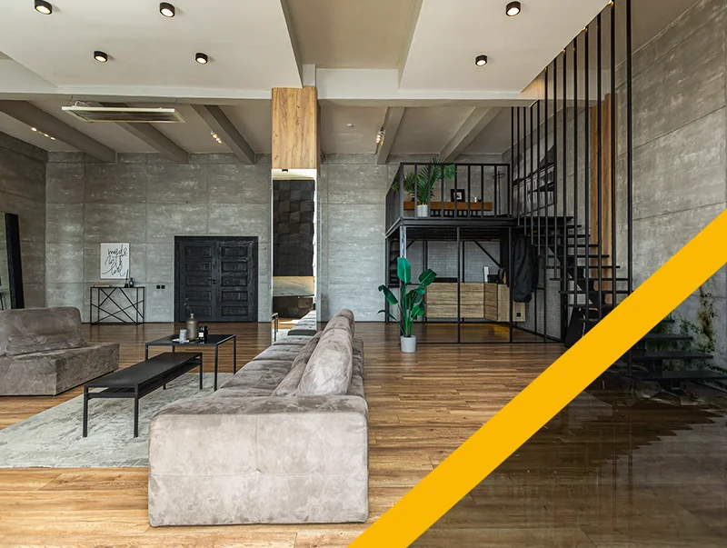 A modern basement showcasing before and after of water damage restoration by Global Arch Construction