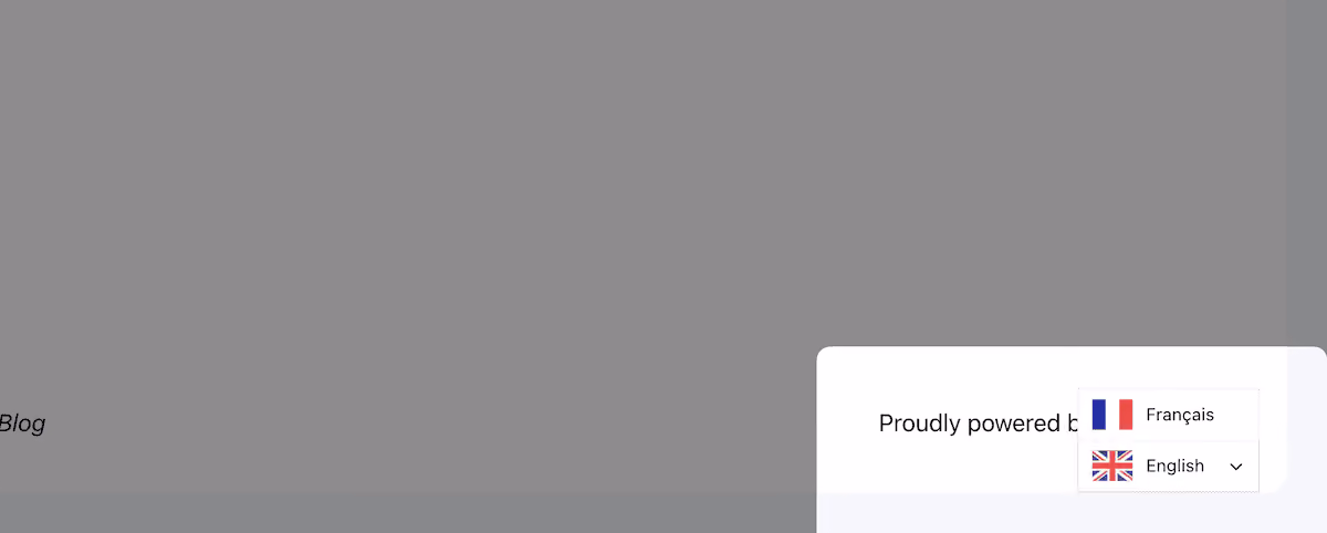 The default Weglot language switcher displayed in the corner of a website, showing a drop-down menu with available language options.