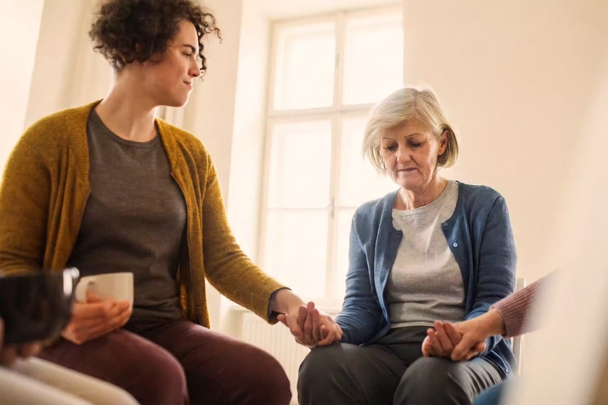 Women talking about betrayal trauma in therapy