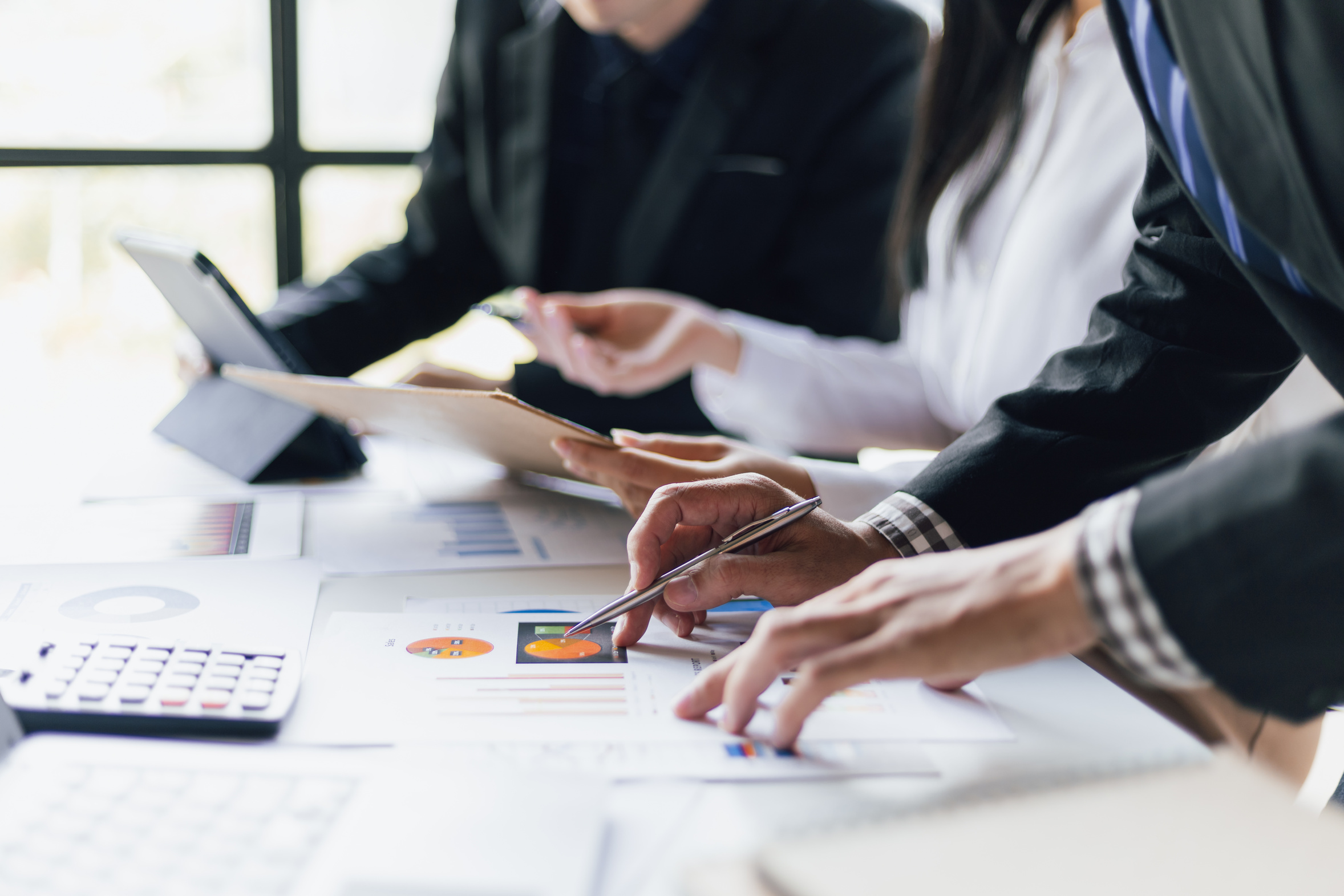 Working through financial charts with advisers