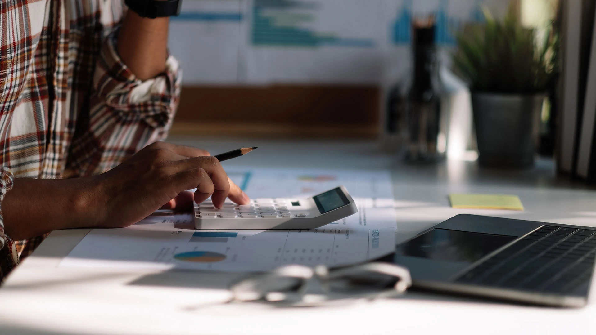 Corporate finance insights from Ramsay & White, business owner reviewing funding options