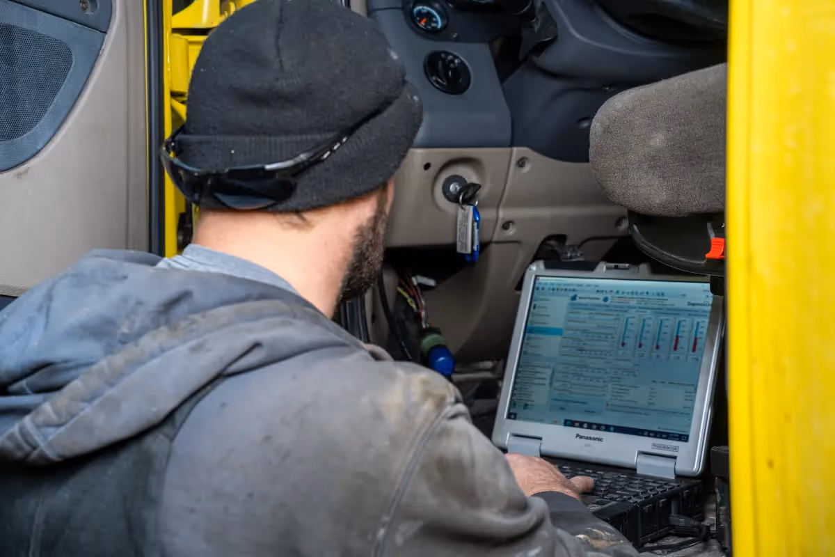 Mechanic providing truck diagnostics in repair shop in Circleville, OH