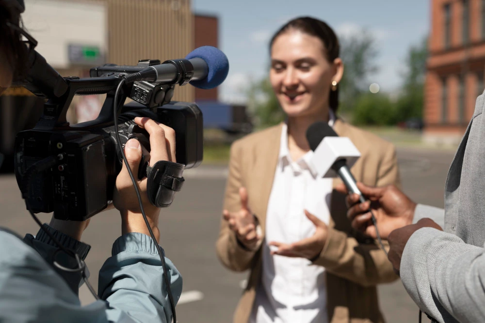 Lady having successful interview after having media training