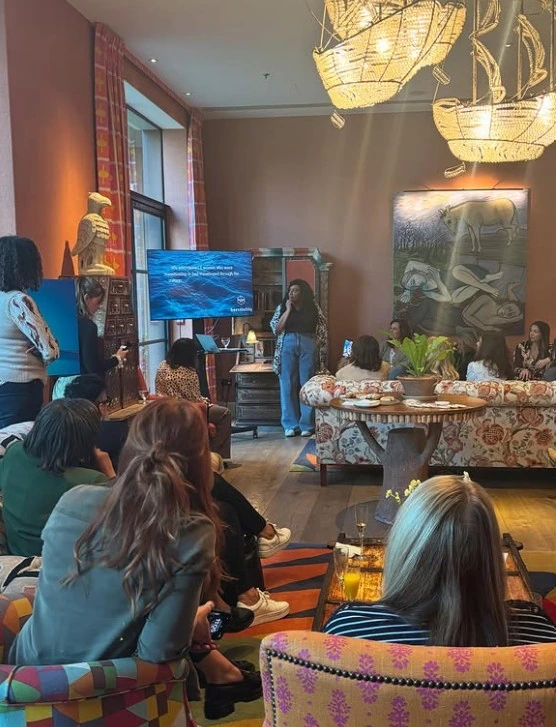 Expertly managed press and launch event for a corporate service, featuring a speaker addressing trade journalists and stakeholders in an intimate roundtable setting to secure maximum attention and guaranteed coverage.