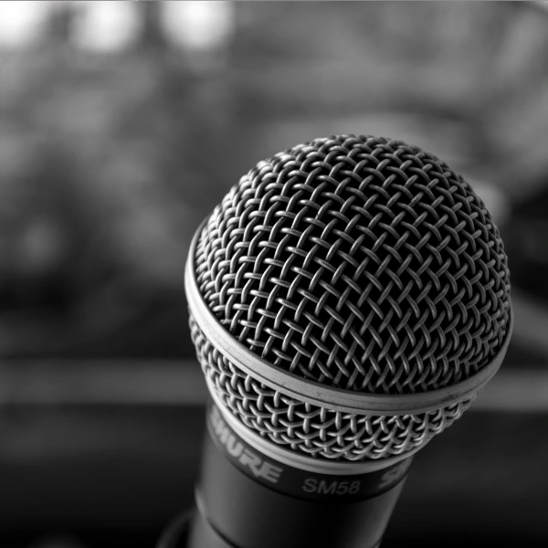 Close-up of a microphone symbolizing Kith&Kind PR's crisis communication and damage limitation services.