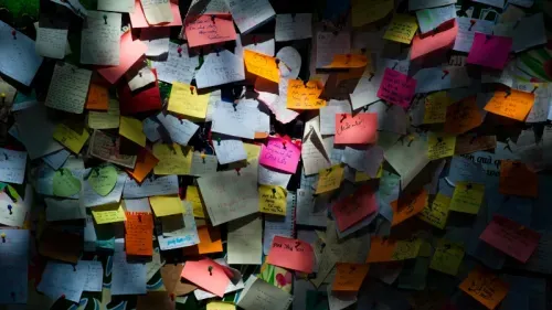 Wall of colourful sticky notes used for brainstorming strategic messaging and corporate positioning