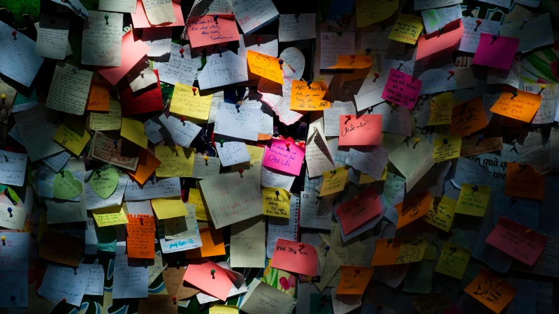 Wall of colourful sticky notes used for brainstorming strategic messaging and corporate positioning