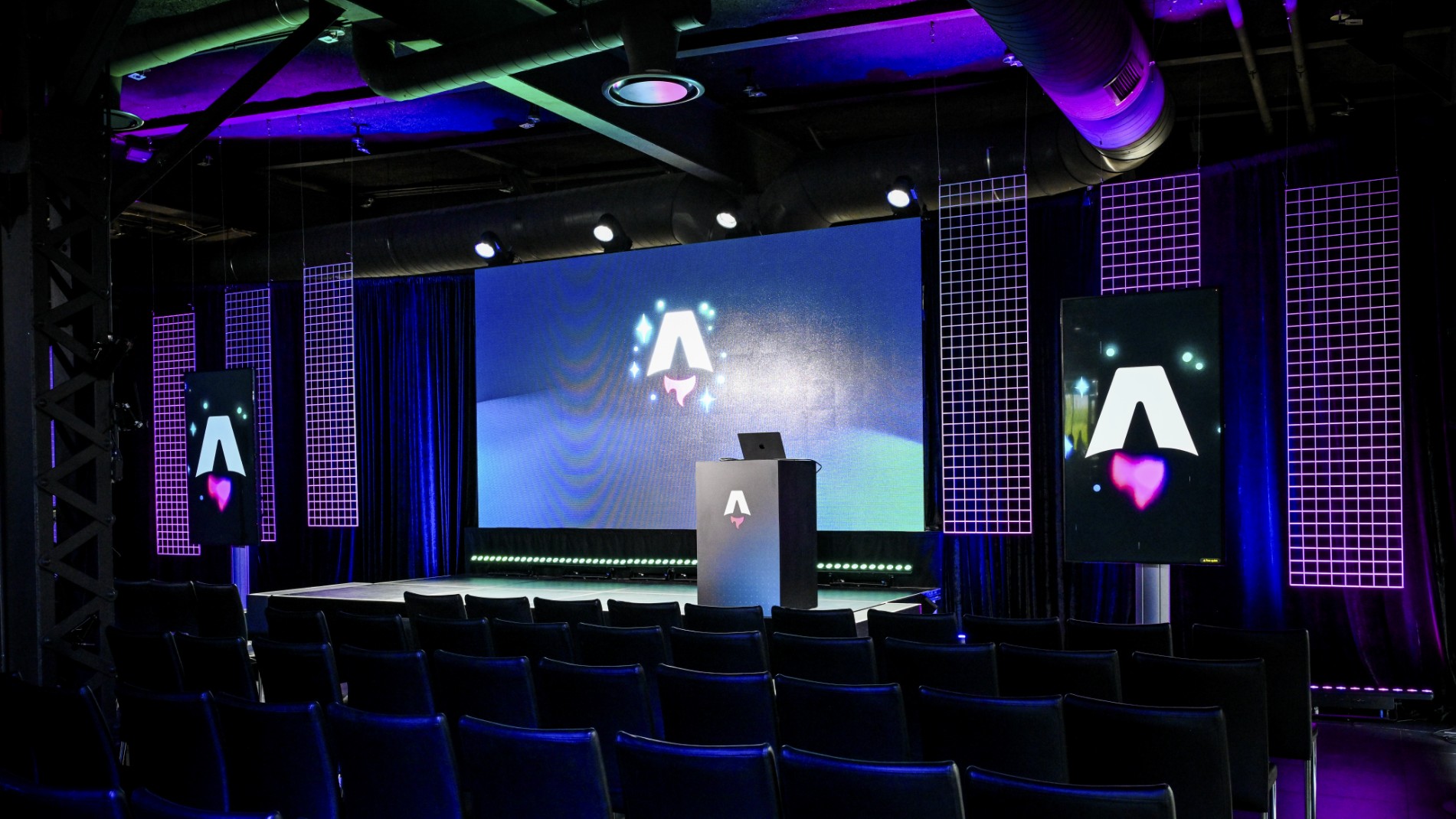 Vibrant corporate stage design with retro visual elements, LED screens, and professional lighting for investor event in Montreal
