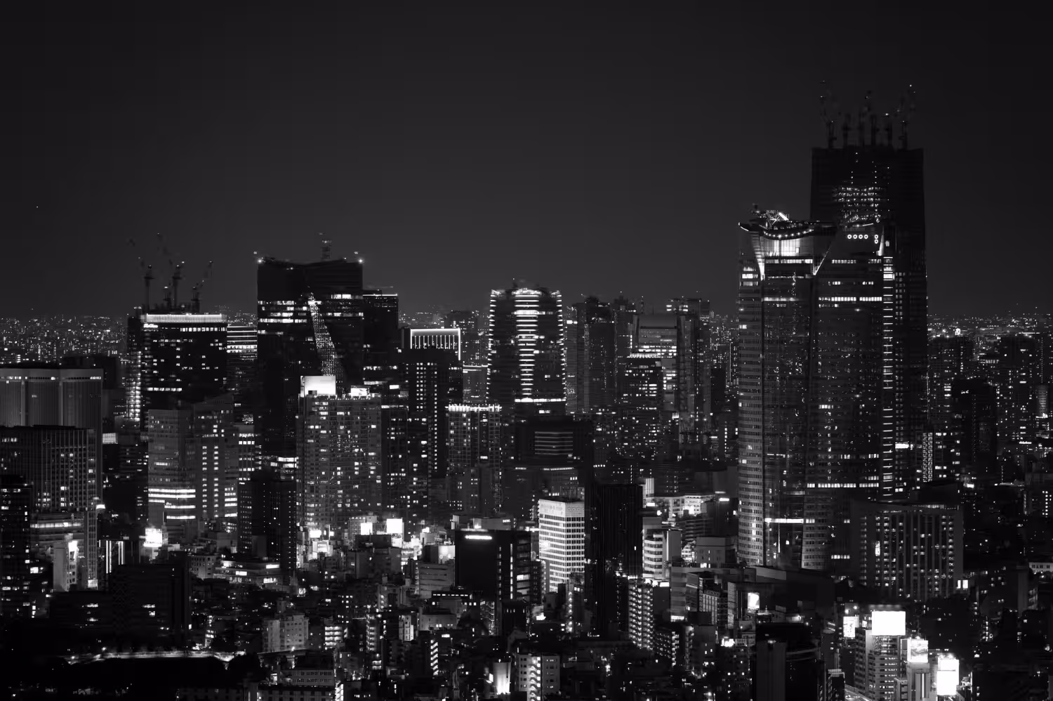 City skyline at night used to convey digital transformation