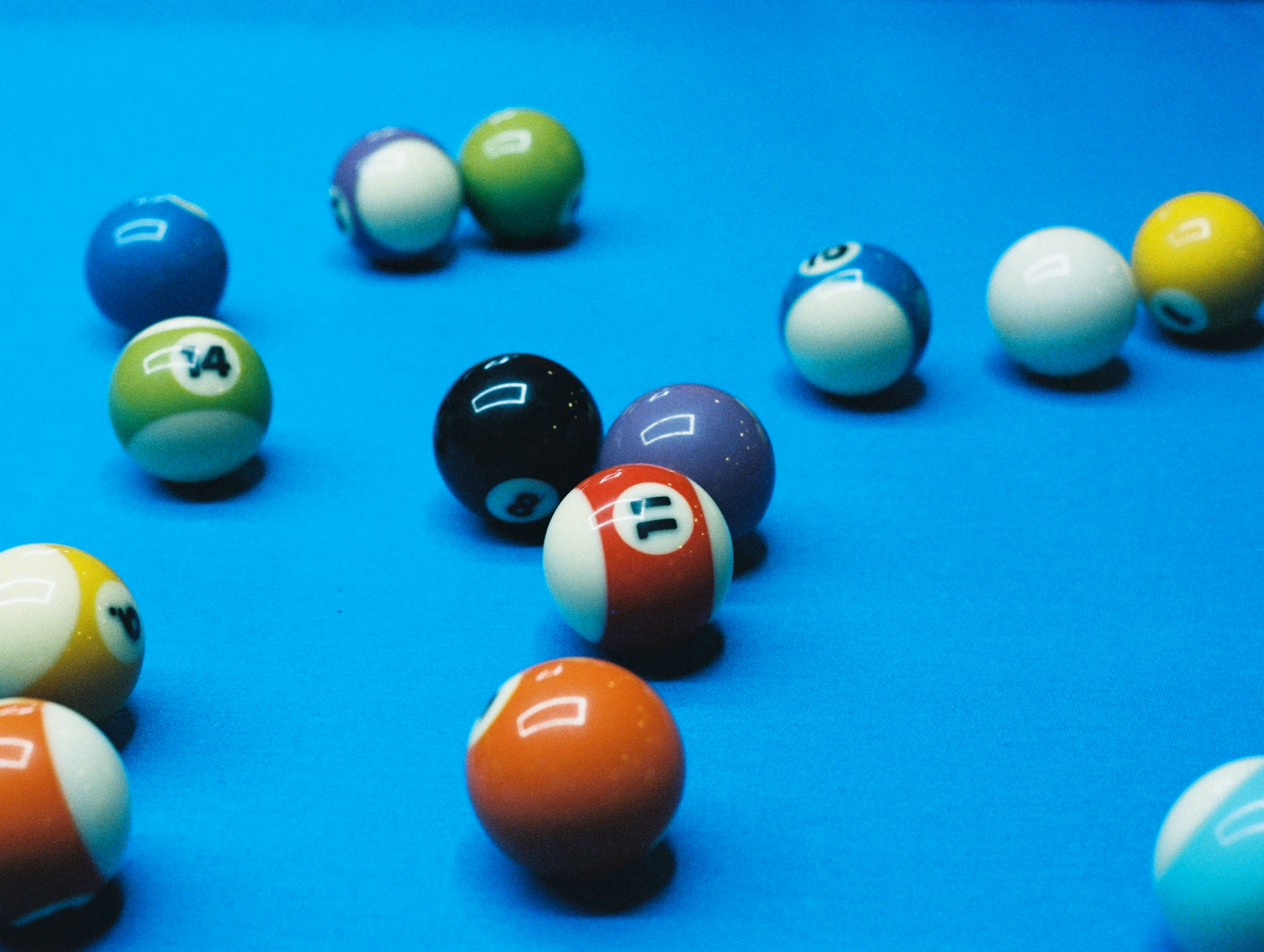Close-up of a billiards table at Old Route 69 Brewery in Ada, Ohio, with colorful pool balls racked and ready for play, highlighting the venue’s game area and social atmosphere.