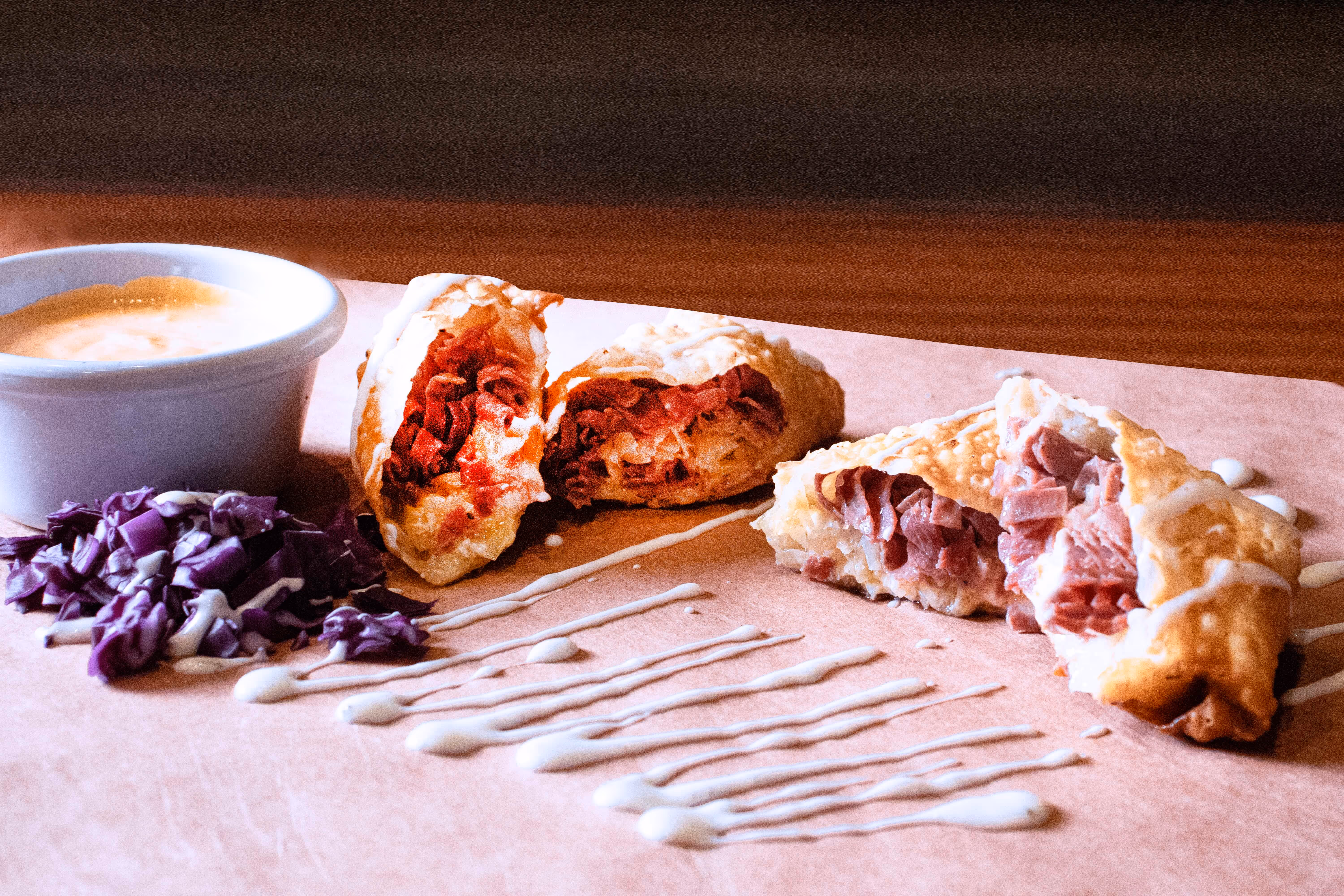 Reuben egg roll from Old Route 69 Brewery in Ada, Ohio, filled with corned beef, Swiss cheese, and sauerkraut, fried to a golden crisp and served with Thousand Island dressing for dipping.