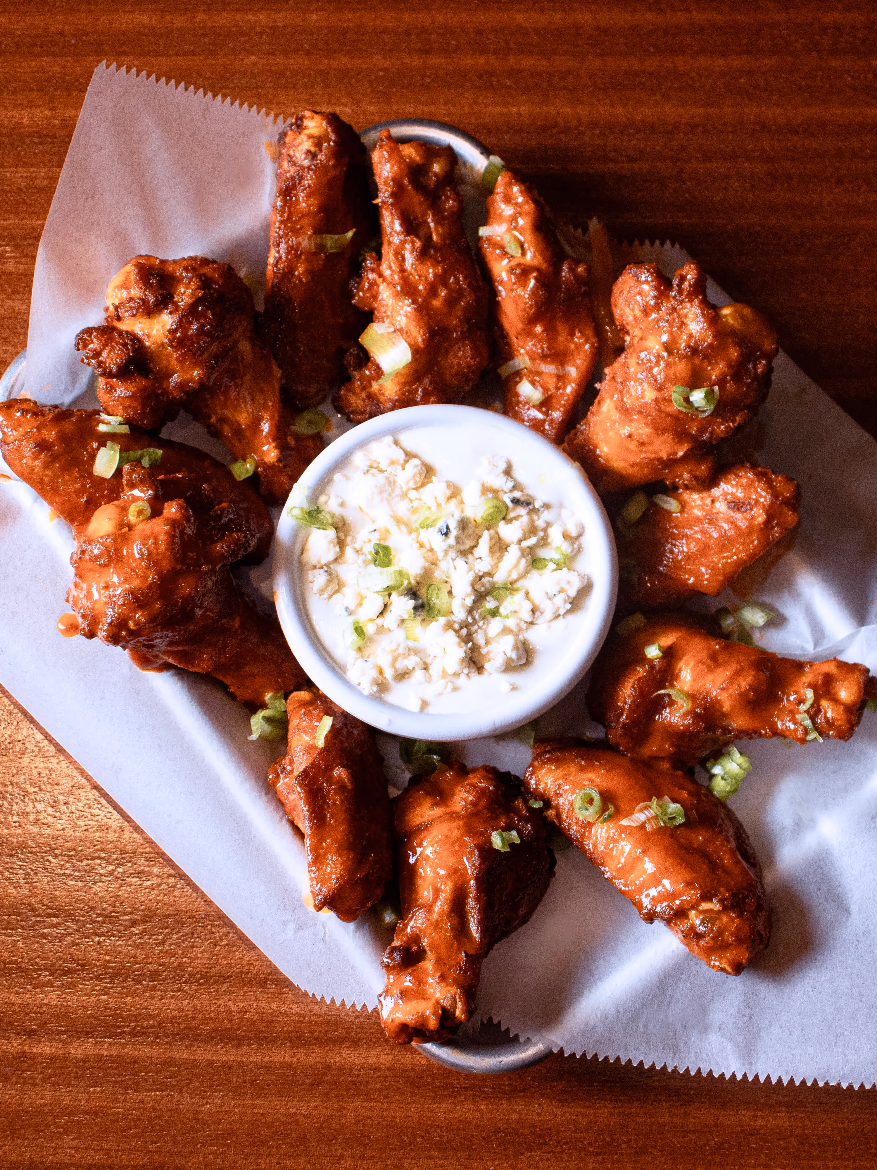 Crispy bone-in chicken wings from Old Route 69 Brewery in Ada, Ohio, tossed in your choice of sauce or dry rub, served with fresh celery, carrot sticks, and a center cup of ranch or blue cheese dressing.