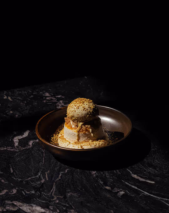 Ice cream topped dessert.