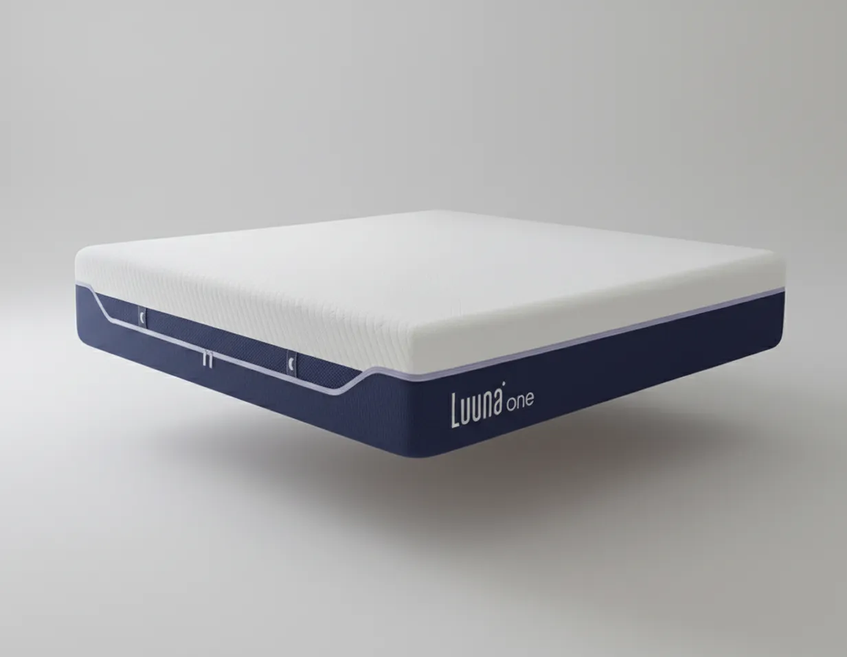 Colchón memory foam individual Luuna One Suave con funda azul marino y capa superior blanca texturizada